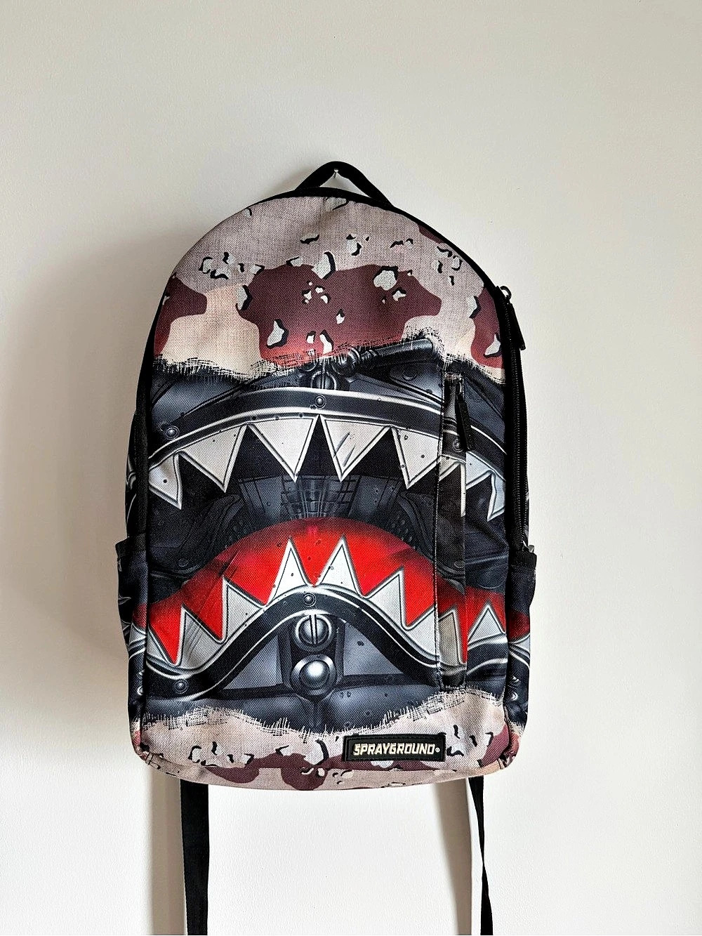 Sprayground Graphic Camo Shark Backpack in Black & Red